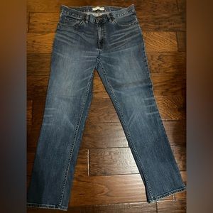 Men’s  Jos A Bank Tailored Fit medium wash jeans.  34 x 32
